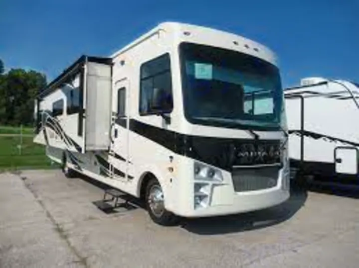 Spacious white Class A RV rental with extended slide-outs, perfect for your next road trip or camping adventure.. Coachmen Mirada 2021