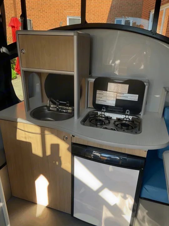 2 burner cooktop and marine style sink mean you can cook and clean up inside!. Safari Condo Alto R1723 Bunkhouse 2022