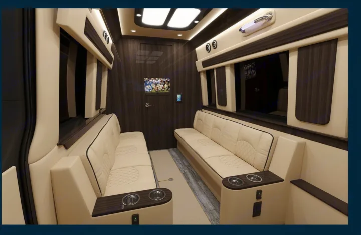 Step inside this upscale rv rental. Features a spacious interior with facing cream leather sofas, wood paneling, and entertainment.. Ultimate Toys Other 2022