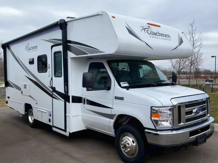 A white Coachmen Freelander Class C motorhome (Ford chassis), suitable for an rv rental.. Coachmen Freelander 2021