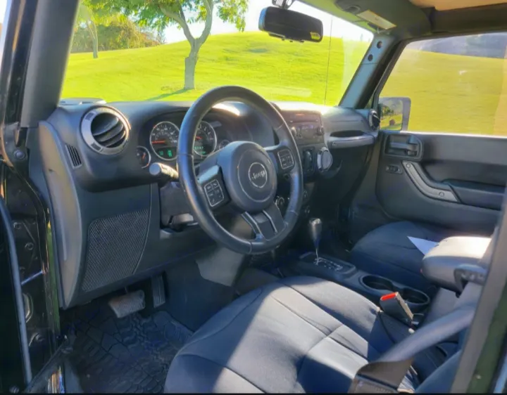 Interior of a rugged Jeep for rent. A great alternative to an RV rental for your outdoor adventures.. Jeep Wrangler 2017