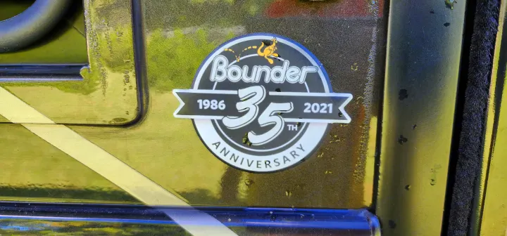 A "Bounder RV" 35th Anniversary (1986-2021) decal on an RV, visible for your next rv rental.. Bounder Bounder Motorhome 2021