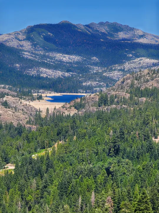 Scenic mountain view with a large dam and reservoir, perfect for your next rv rental adventure.. Starcraft Centennial 2005