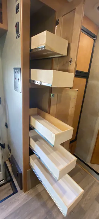 RV rental with smart interior storage: pull-out pantry drawers for easy access and organization.. Winnebago Minnie Winnie 2019
