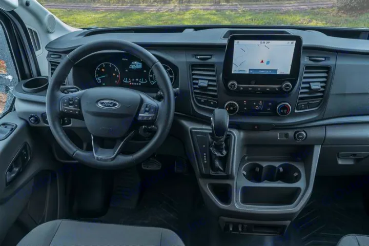 View of a Ford camper van interior, ideal for RV rental.. WINNEBAGO EKKO 2023