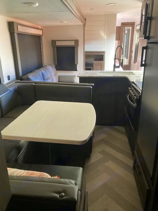 Spacious RV rental interior featuring a full kitchen, comfy dinette, and versatile living space for your trip.. Forest River Salem 2020
