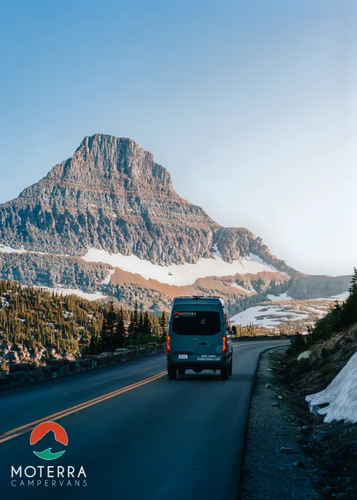 Grey Moterra campervan on a winding mountain road with snow. Your next RV rental adventure awaits here.. Mercedes-Benz Sprinter 2020