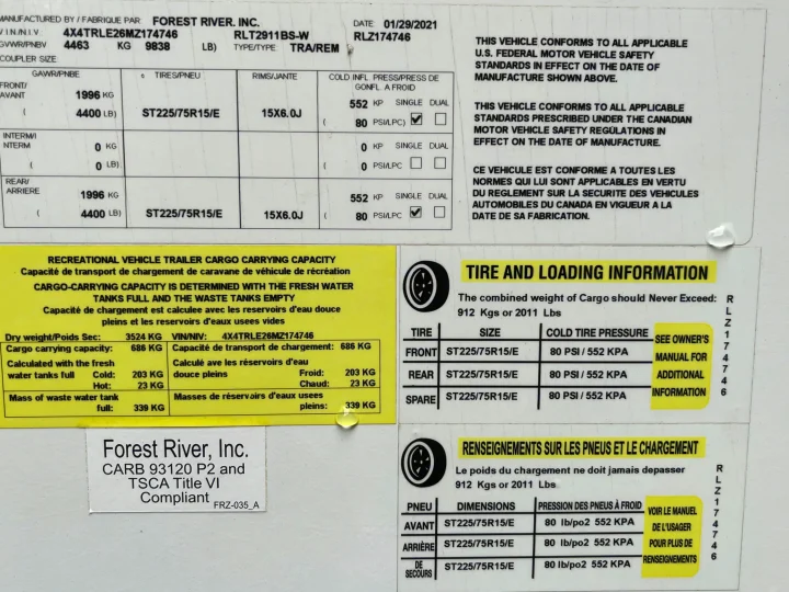 This RV rental safety label details critical weights, tire sizes, and cargo capacity for safe operation and regulatory compliance.. Forest River Rockwood Ultra Lite 2021