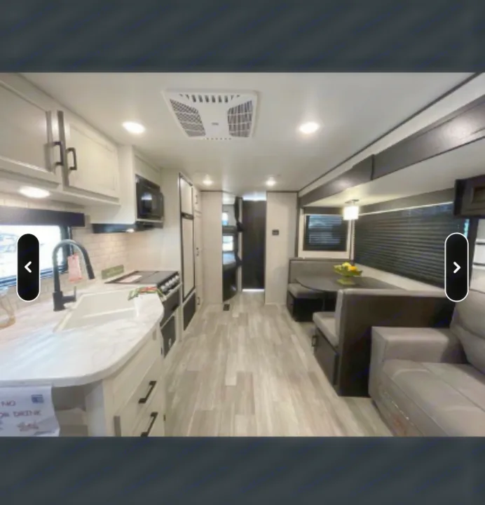 Modern RV rental interior: full kitchen, dinette, sofa, and bunks. Ready for your road trip adventure.. Jayco Jay Flight SLX Rocky Mountain Edition 2022