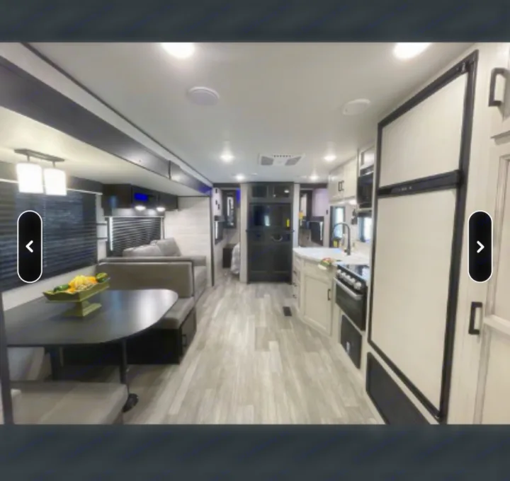 Spacious RV rental interior featuring a modern kitchen, comfortable dinette, and bright living area.. Jayco Jay Flight SLX Rocky Mountain Edition 2022