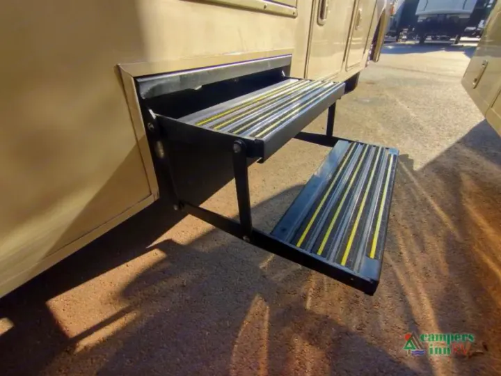 Easy access to your RV rental! View the durable, retractable entry steps with yellow non-slip strips on this motorhome.. Winnebago Vista 2017