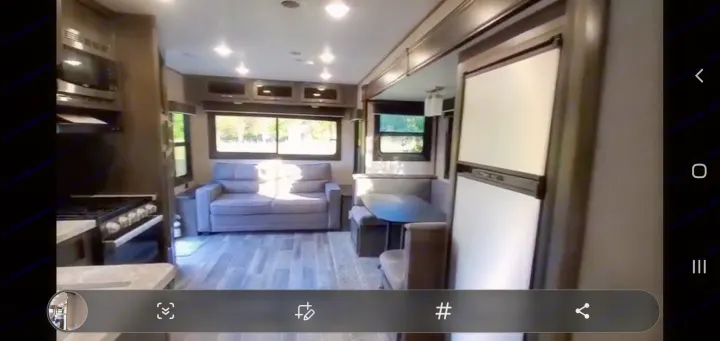Spacious RV rental interior with kitchen, living, and dining areas. Perfect for your next adventure.. Jayco Jay Flight SLX Rocky Mountain Edition 2021