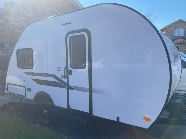 White Braxton Creek 17 FD travel trailer, perfect for your next RV rental adventure.. Braxton Creek Bushwhacker Plus 2022