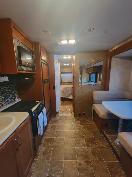 View of kitchen and dinette,  entrance to master . 2014 Ace 2014