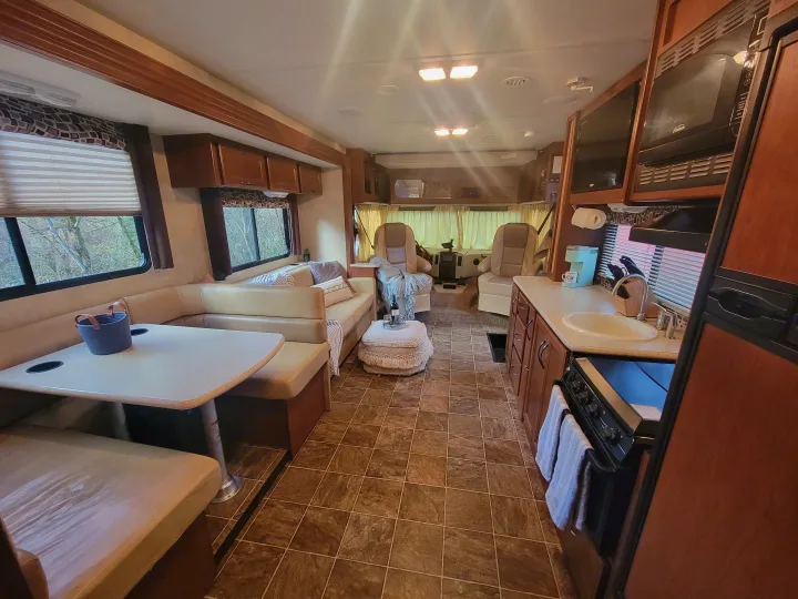 Great view of the lounge space, dinette,  and kitchen. 2014 Ace 2014