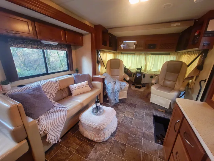 The coziest of lounging to be had in this space. Seating for a whole family or even a couple . 2014 Ace 2014
