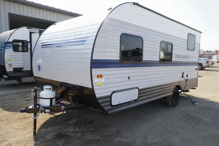 Grey Gulf Stream Trailmaster travel trailer with front propane tank, excellent for RV rental.. Gulf Stream Trailmaster 2022