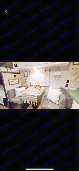 Cozy RV rental showcasing a decorated dinette area, patterned table runner, and bunk beds. Homey comfort for travel.. Forest River Cherokee Wolf Pup 2022