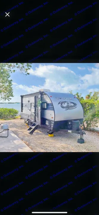 Spacious Wolf Pup travel trailer, perfect for your next rv rental adventure by the water. Parked & ready for outdoor fun.. Forest River Cherokee Wolf Pup 2022