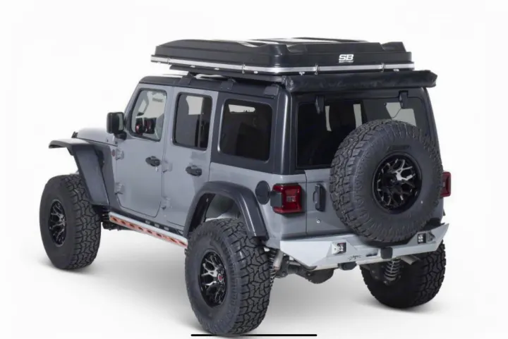 Modified grey Jeep Wrangler, equipped for off-road adventures with a rooftop tent. Great for a rugged rv rental.. Smittybilt Hardshell RTT 2022