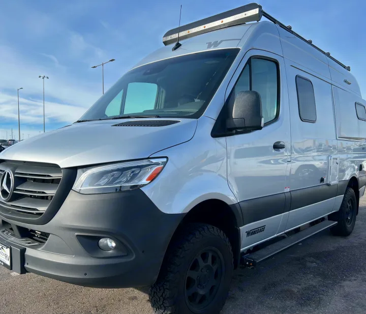 Silver Winnebago Revel 4x4 camper van (Mercedes-Benz Sprinter base) for your next rv rental adventure.. Winnebago Revel 2020