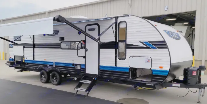 Light gray travel trailer with extended awning & LED lights, open steps. Ready for your next rv rental adventure.. Forest River Other 2023