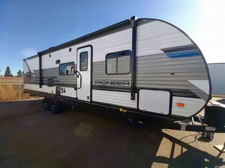 This white and gray Pioneer travel trailer is ready for your next RV rental adventure.. Heartland RVs Pioneer 2021