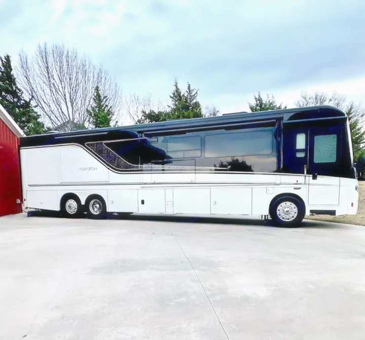 Luxurious black & white Horizon RV motorhome parked on concrete. Explore adventure options for your next RV rental.. Winnebago Horizon 2020