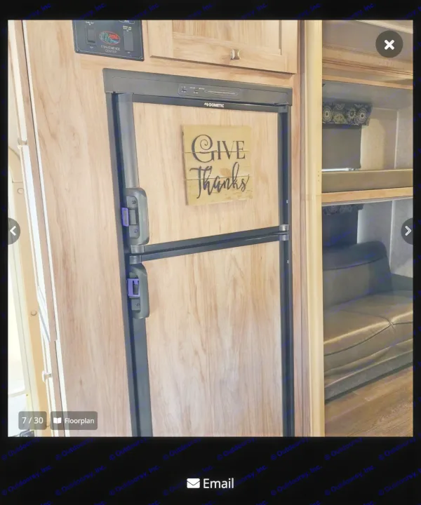 Interior of this RV rental features a Dometic refrigerator with a 'Give Thanks' sign, control panel, and bunk beds.. Forester Forester Motorhome 2017