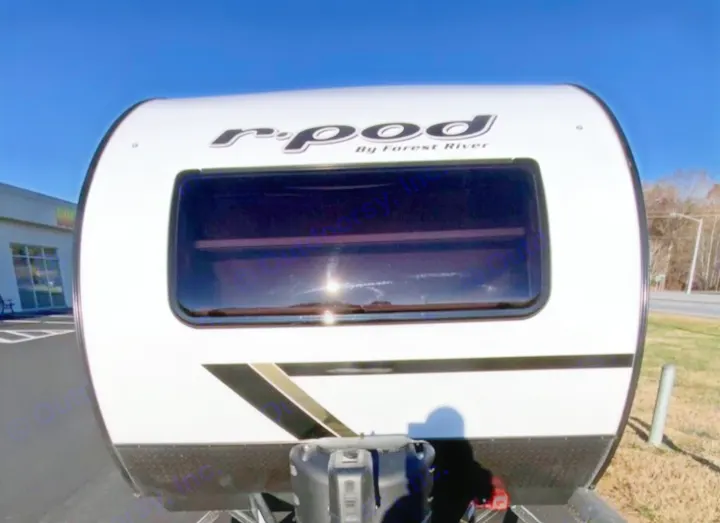 White r-pod rv rental travel trailer, front view with a large tinted window and hitch.. Forest River R POD 193  H.R. EDITION 2022