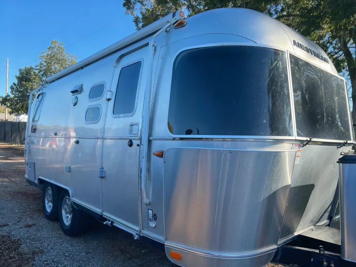 Beautiful silver Airstream travel trailer, ideal for your next rv rental adventure. Parked on gravel.. Airstream Flying Cloud 2017