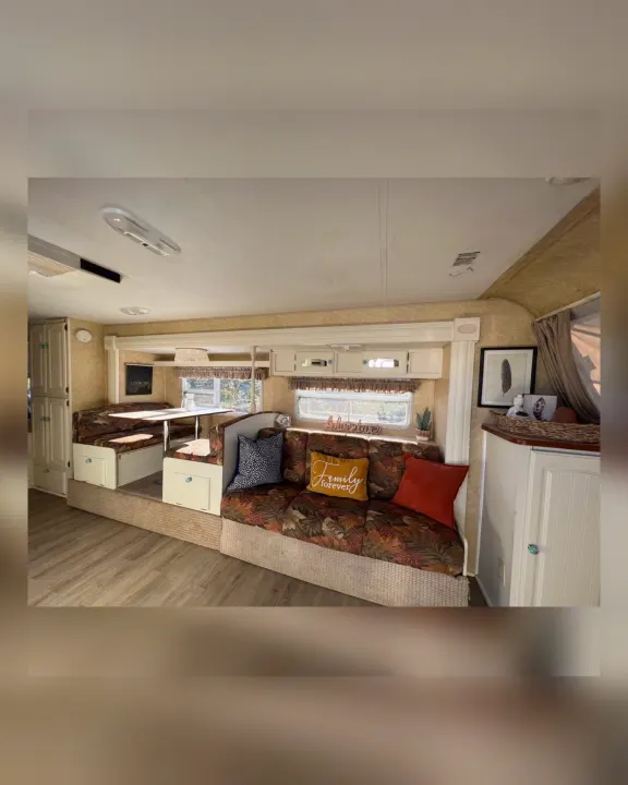 Step inside this cozy rv rental! Features a dinette, comfy sofa, and thoughtful decor for your next camper journey.. Starcraft Antigua 2007