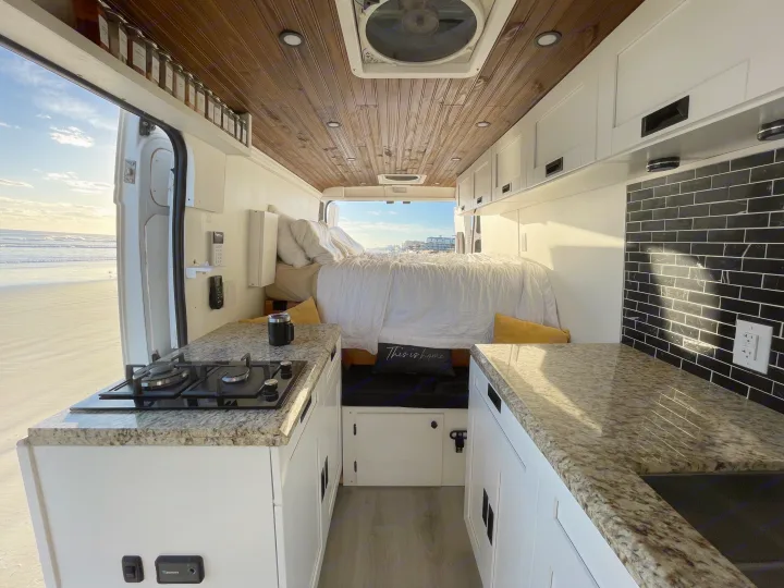 RV rental with a full kitchen, cozy bed, and stunning beach views. Ideal for a coastal adventure.. Other Other 2020