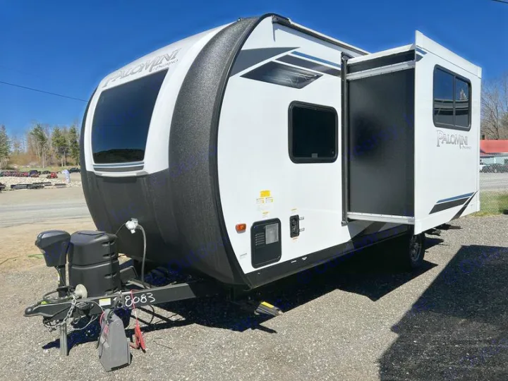 This white Palomini travel trailer, with front hitch and extended slide-out, perfect for your next rv rental adventure.. Forest River Palomino Palomini 2022