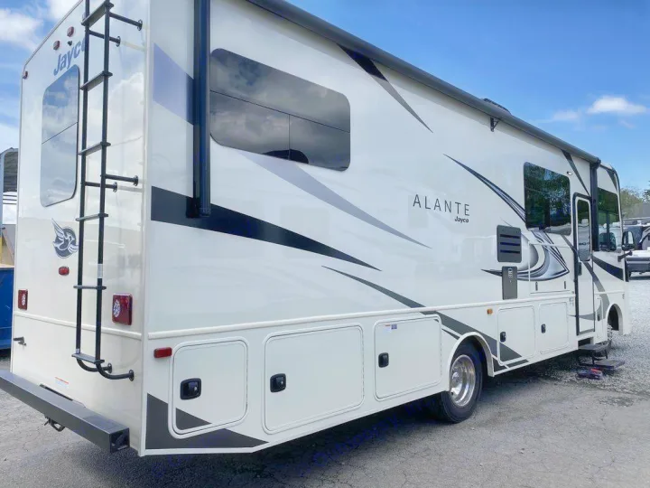 Clean white Alante Jayco motorhome with graphics, ladder, and storage. Perfect for your next rv rental.. Jayco Alante 2023