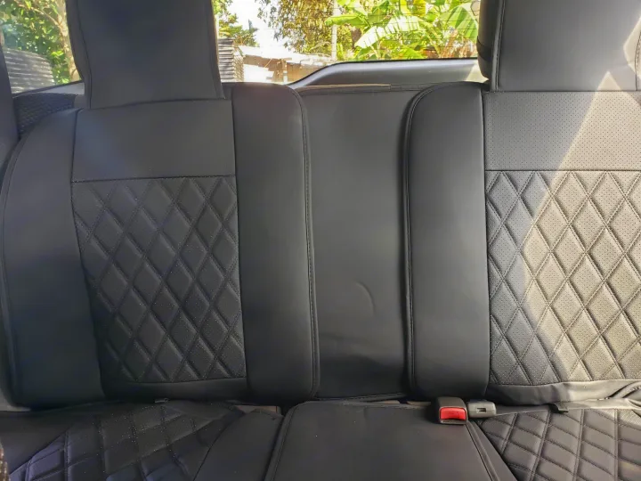 Plush black car seat covers feature quilted diamond & perforated patterns, ensuring comfort for your RV rental adventure.. Other Other 2015