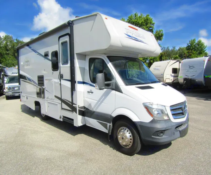 A white and gray Class C motorhome (Prism) on a Mercedes-Benz Sprinter chassis, ready for rv rental or travel.. Coachmen Prism 2022