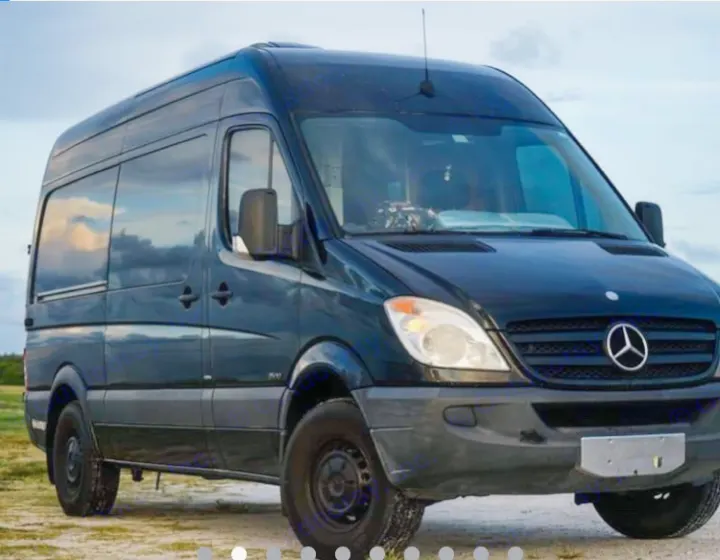 Rugged black Mercedes-Benz Sprinter van, perfect for your next RV rental adventure.. Mercedes Sprinter 2013