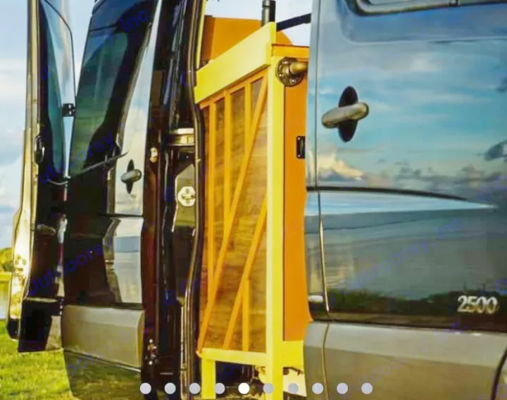Open rear doors of a dark Mercedes Sprinter 2500 RV rental expose a warm custom-built wooden interior.. Mercedes Sprinter 2013