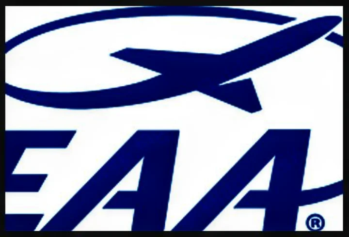Blue EAA (Experimental Aircraft Association) aviation logo: airplane in oval above stylized letters. Not related to rv rental services.. Other TRAVEL TRAILER 2025