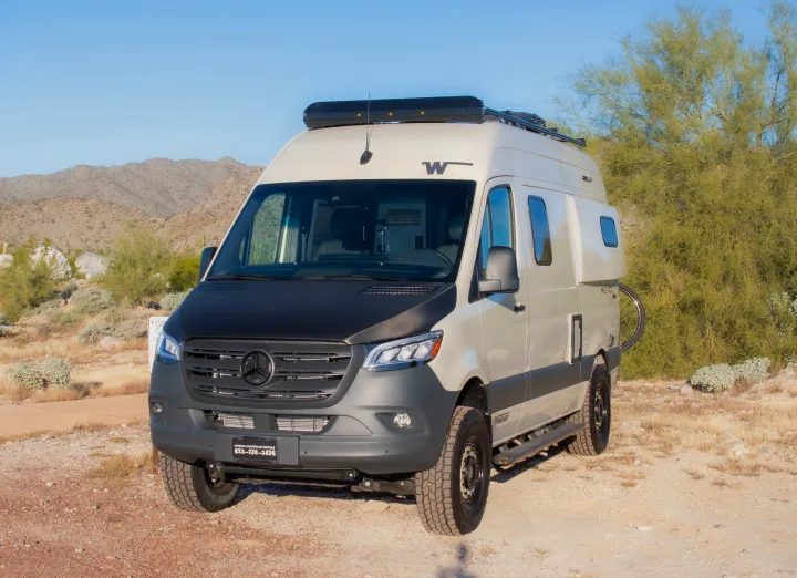 Explore Arizona with this sleek Mercedes Sprinter rv rental campervan, parked amidst desert and mountains.. Winnebago Revel 2023