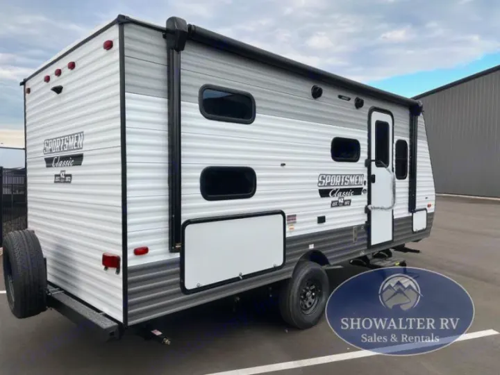 This white and gray Sportsmen Classic travel trailer is perfect for your next RV rental adventure. See its side exterior view.. KZ Sportsmen Classic 191BHK 2025
