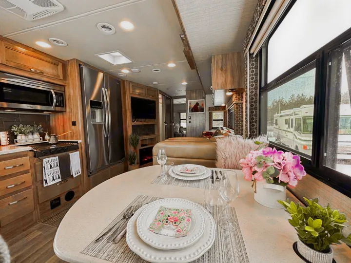 Step inside this comfortable RV rental. Features a full kitchen, dining area, and cozy living space for road trip adventures.. Jayco Precept 2019