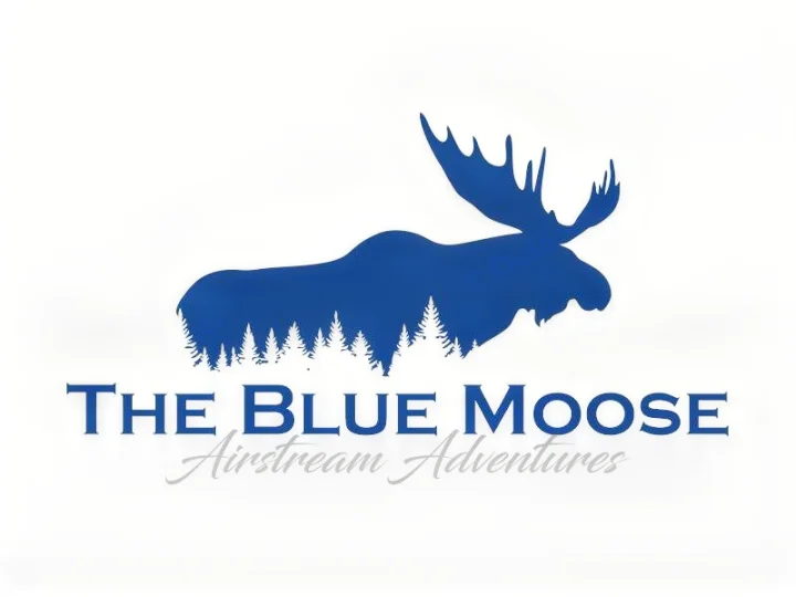 The Blue Moose Airstream Adventures logo: A dark blue moose silhouette with trees, representing an RV rental service for outdoor travel.. Airstream Other 2003