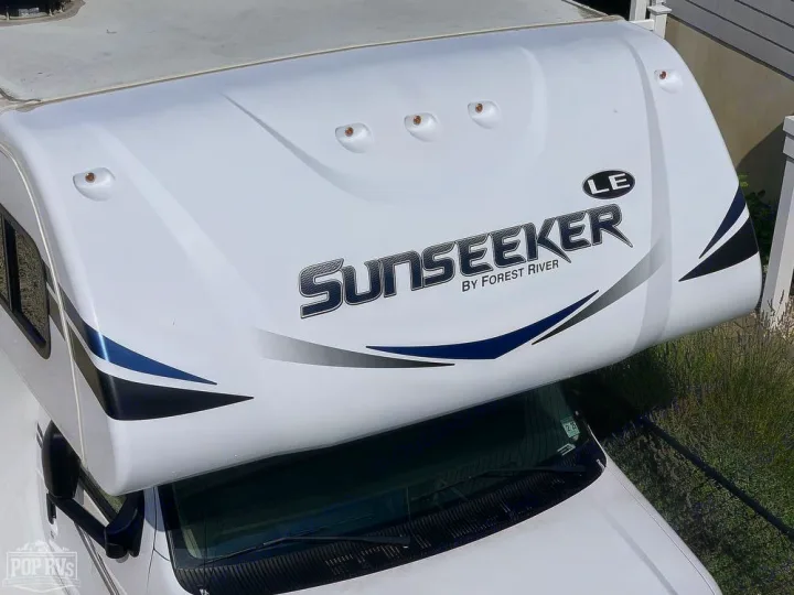 Overhead view of a bright white Sunseeker Class C motorhome with blue/grey graphics, excellent for an rv rental adventure.. Forest River Sunseeker LE 2020
