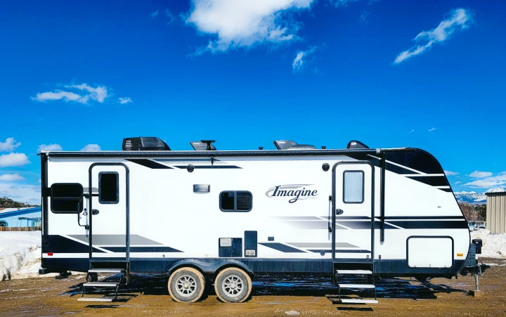 Outside passenger side view.  Two doors with sturdy stairs. . Grand Design Other 2019