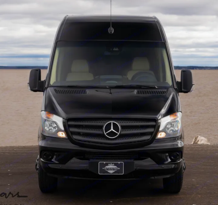 Front view of a sleek black Mercedes-Benz Sprinter conversion van, ideal for RV rental adventures.. Midwest Automotive Designs Daycruiser 2019