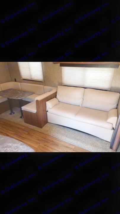 Cozy rv rental interior featuring a dinette with table and a comfortable sofa. Ideal for travel adventures.. Jayco Jay Flight 2016