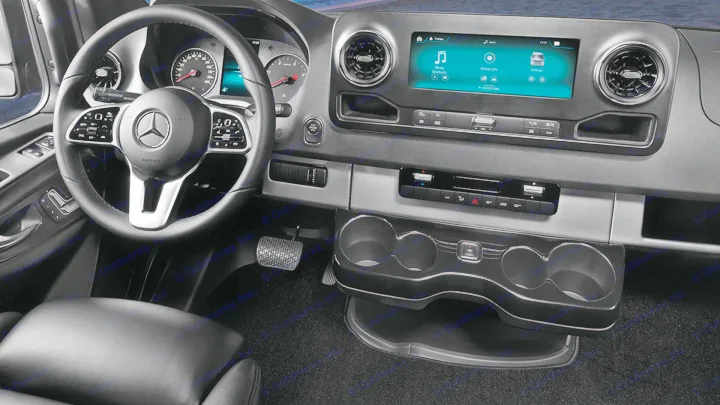 Modern Mercedes-Benz van dashboard, perfect for your next rv rental adventure. See the steering wheel, infotainment, and cupholders.. Airstream Interstate 2021