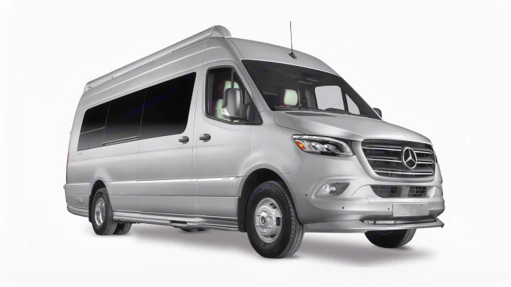 A silver Mercedes-Benz Sprinter RV rental van, presented from a front-quarter view, highlights its sleek design and tinted windows.. Airstream Interstate 2021